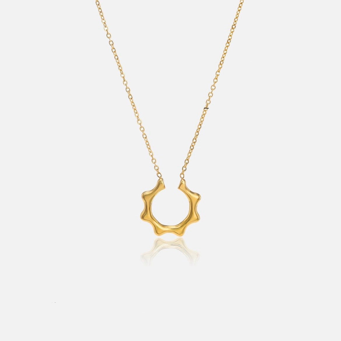 Sun FlowerThe Sun Flower Necklace is a radiant piece of jewelry made with stainless steel and plated in 18K gold. This necklace showcases a charming sunflower pendant that repStainless SteelSun Flower