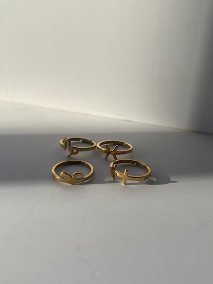 ZodiacThe Zodiac Rings 18k Gold Plated are celestial-inspired accessories that combine the beauty of astrology with luxurious materials. Each ring represents a specific zoStainless SteelZodiac